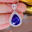 14K GOLD 7.59 CTW NATURAL TANZANITE & DIAMOND PENDANT