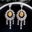 14K GOLD 4.25 CTW NATURAL YELLOW DIAMOND & DIAMOND EARRINGS