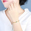 14K GOLD 0.60 CTW VIVID GREEN NATURAL EMERALD & DIAMOND BRACELET