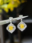 14K GOLD 1.60 CTW NATURAL YELLOW DIAMOND & DIAMOND EARRINGS