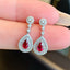 14K GOLD 1.06 CTW NATURAL RUBY & DIAMOND EARRINGS
