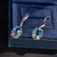 14K GOLD 9.29 CTW NATURAL TOPAZ & DIAMOND EARRINGS