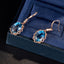 14K GOLD 9.29 CTW NATURAL TOPAZ & DIAMOND EARRINGS