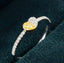 14K GOLD 0.26 CTW NATURAL YELLOW DIAMOND & DIAMOND RING