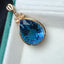 14K GOLD 17.70 CTW NATURAL TOPAZ & DIAMOND PENDANT