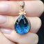 14K GOLD 17.70 CTW NATURAL TOPAZ & DIAMOND PENDANT