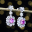 14K GOLD 2.07 CTW NATURAL PADPARADSCHA SAPPHIRE & DIAMOND EARRINGS