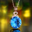 14K GOLD 10.45 CTW NATURAL TOPAZ & DIAMOND PENDANT