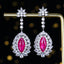 14K GOLD 9.88 CTW NATURAL RUBY & SAPPHIRE EARRINGS