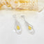 14K GOLD 1.44 CTW NATURAL YELLOW DIAMOND & DIAMOND EARRINGS