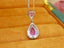 14K GOLD 2.28 CTW NATURAL PADPARADSCHA SAPPHIRE & DIAMOND PENDANT