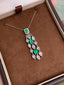 14K GOLD 1.25 CTW VIVID GREEN NATURAL EMERALD & DIAMOND PENDANT