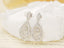 14K GOLD 1.12 CTW NATURAL H DIAMOND EARRINGS