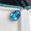 14K GOLD 10.01 CTW NATURAL TOPAZ & DIAMOND PENDANT