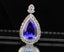 14K GOLD 13.99 CTW NATURAL TANZANITE & DIAMOND PENDANT