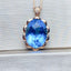 14K GOLD 10.23 CTW NATURAL TOPAZ & DIAMOND PENDANT