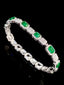 14K GOLD 6.11 CTW VIVID GREEN NATURAL EMERALD & DIAMOND BRACELET