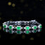 14K GOLD 2.55 CTW VIVID GREEN NATURAL EMERALD & DIAMOND BRACELET