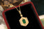 14K GOLD 0.68 CTW VIVID GREEN NATURAL EMERALD & DIAMOND PENDANT