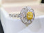 14K GOLD 0.61 CTW NATURAL YELLOW DIAMOND & DIAMOND RING