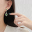 14K GOLD 2.30 CTW NATURAL EMERALD & DIAMOND EARRINGS