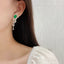 14K GOLD 4.69 CTW NATURAL EMERALD & DIAMOND EARRINGS