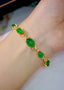 14K GOLD 12.10 CTW NATURAL EMERALD & DIAMOND BRACELET