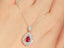 14K GOLD 1.95 CTW NATURAL RUBY & DIAMOND PENDANT