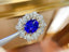 14K GOLD 8.02 CTW NATURAL TANZANITE & DIAMOND RING