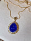 14K GOLD 29.58 CTW NATURAL TANZANITE & DIAMOND PENDANT