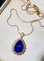 14K GOLD 29.58 CTW NATURAL TANZANITE & DIAMOND PENDANT