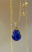 14K GOLD 14.55 CT NATURAL TANZANITE & DIAMOND PENDANT