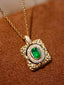 14K GOLD 0.38 CTW VIVID GREEN NATURAL EMERALD & DIAMOND PENDANT