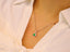 14K GOLD 0.87 CTW VIVID GREEN NATURAL EMERALD & DIAMOND PENDANT