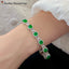 14K GOLD 7.4 CTW VIVID GREEN NATURAL EMERALD & DIAMOND BRACELET