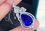 14K GOLD 10.62 CTW NATURAL TANZANITE & DIAMOND PENDANT