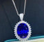 14K GOLD 19.0 CTW NATURAL TANZANITE & DIAMOND PENDANT