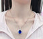 14K GOLD 19.0 CTW NATURAL TANZANITE & DIAMOND PENDANT