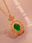 14K GOLD 1.78 CTW VIVID GREEN NATURAL EMERALD & DIAMOND PENDANT