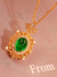 14K GOLD 1.78 CTW VIVID GREEN NATURAL EMERALD & DIAMOND PENDANT