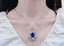 14K GOLD 12.94 CTW NATURAL TANZANITE & DIAMOND PENDANT