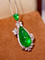 14K GOLD 10.97 CTW VIVID GREEN NATURAL EMERALD & DIAMOND PENDANT