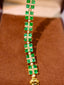 14K GOLD 6.83 CTW VIVID GREEN NATURAL EMERALD & DIAMOND BRACELET