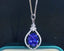 14K GOLD 4.02 CTW NATURAL TANZANITE & DIAMOND PENDANT