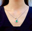 14K GOLD 2.66 CTW VIVID GREEN NATURAL EMERALD & DIAMOND PENDANT