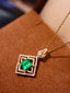 14K GOLD 1.03 CTW VIVID GREEN NATURAL EMERALD & DIAMOND PENDANT