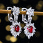 14K GOLD 3.63 CTW NATURAL RUBY & SAPPHIRE EARRINGS