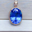 14K GOLD 10.54 CTW NATURAL TOPAZ & DIAMOND PENDANT