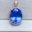 14K GOLD 10.54 CTW NATURAL TOPAZ & DIAMOND PENDANT