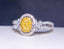 14K GOLD 0.58 CTW NATURAL YELLOW DIAMOND & DIAMOND RING